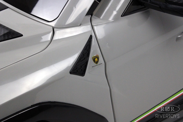 Детский автомобиль RiverToys Lamborghini Urus E777EE