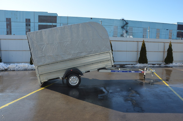 Прицеп для автомобиля Tavials Универсальный ДОН5521 бортовой + лодочный